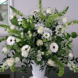 White roses and gerberas sympathy arrangement
